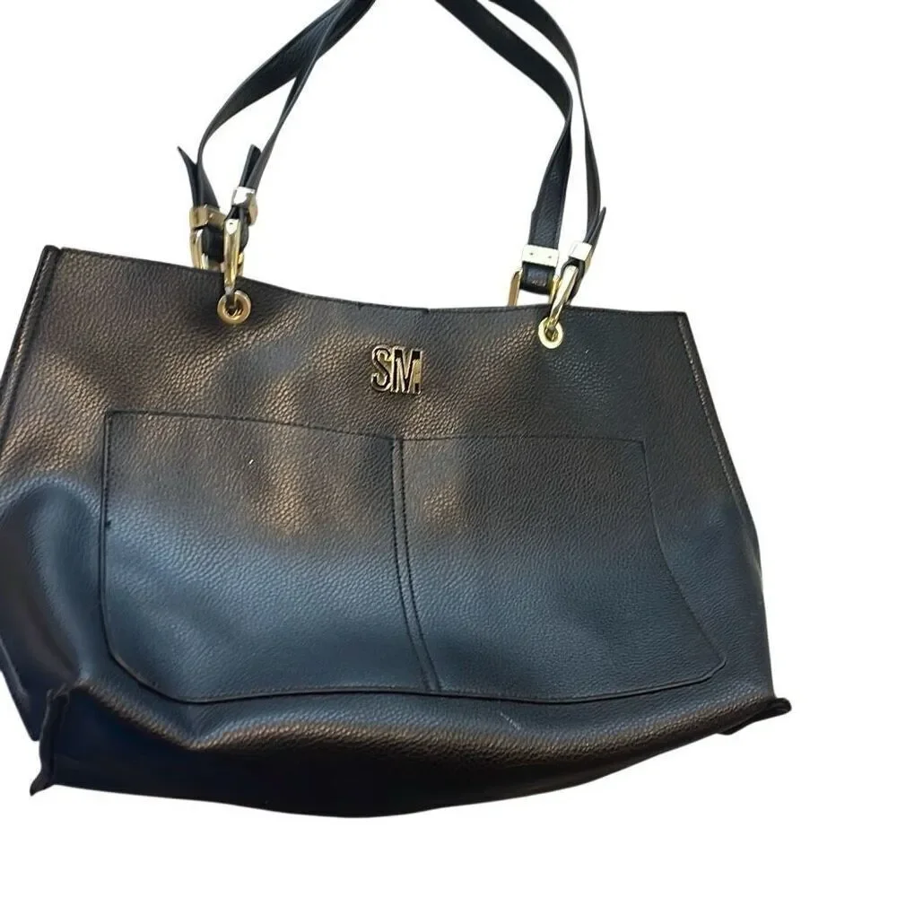 Steve  Madden Black tote, small flaw on top above nameplate